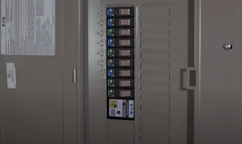 An opened main breaker panel box