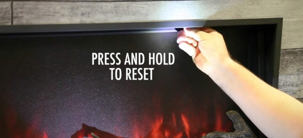To reset an electric fireplace, simply press and hold the designated button.