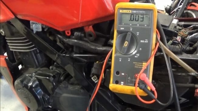 multimeter on an engine