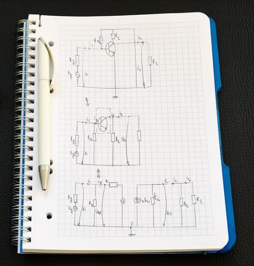 notebook with diagram drawings