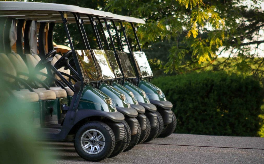 golf carts in a row