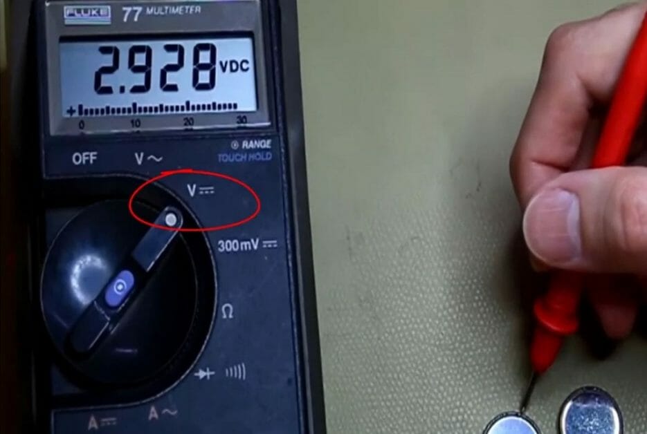 multimeter at a reading of 2.928 vdc