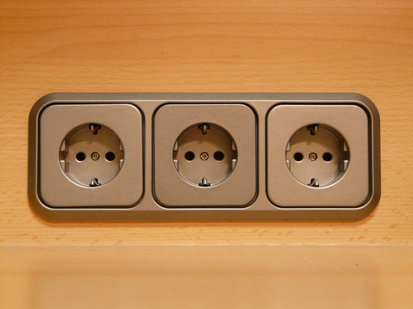 a group of 3 2-prong outlet