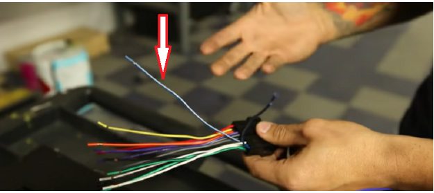 different wires in man's hand