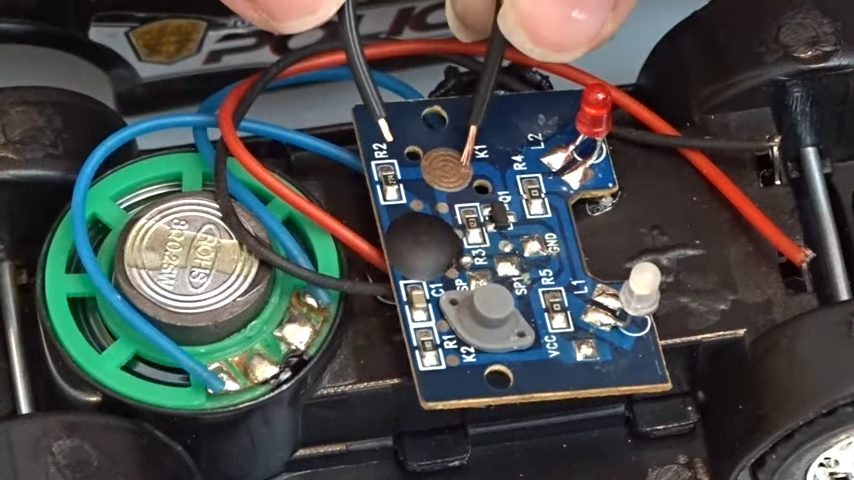 inserting the battery into the circuit