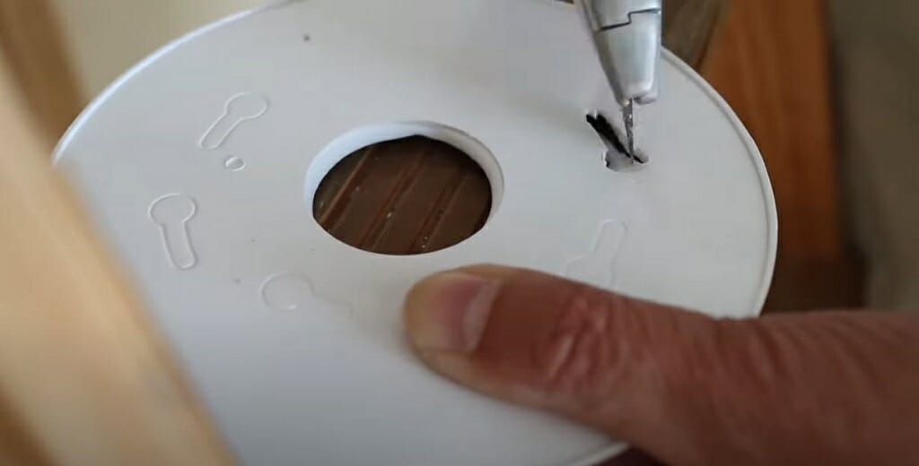 making the holes on the mounting bracket