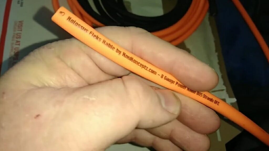 orange copper wire with label writing
