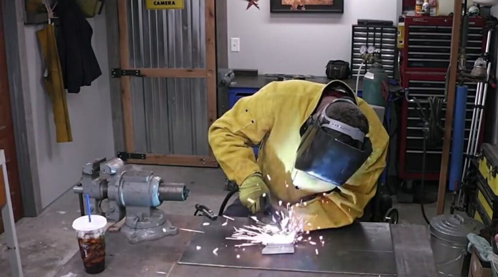 running the welding torch through the welding line