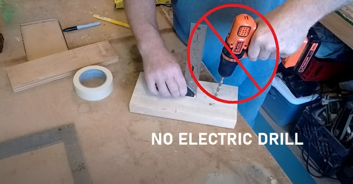 A person doing no electric drill