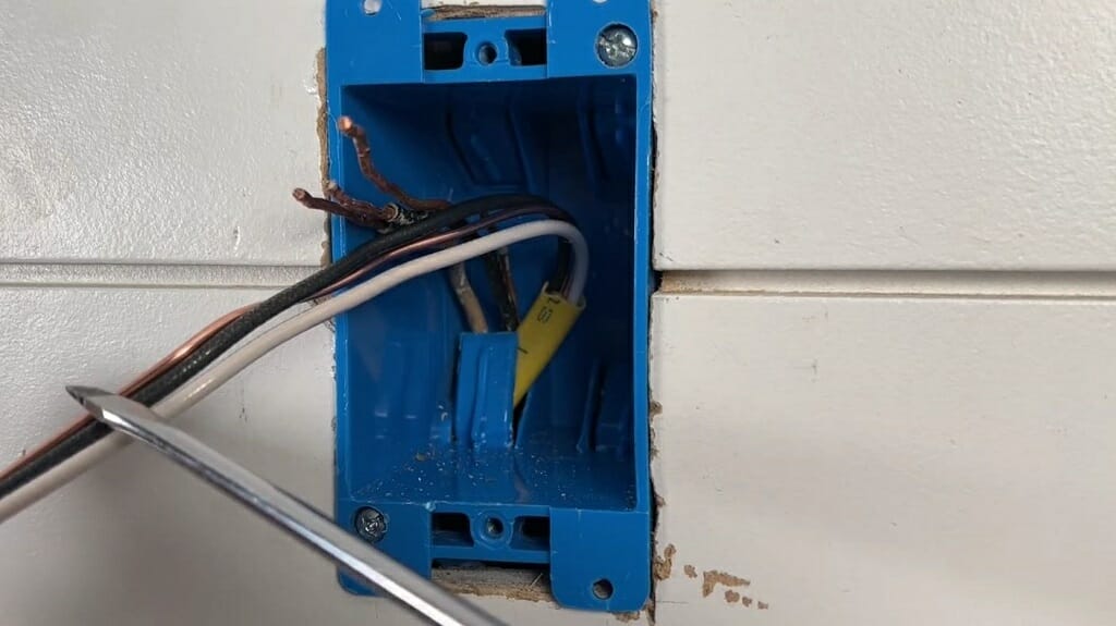 cutting wire in an outlet box