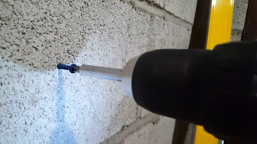drilling a hole on the wall