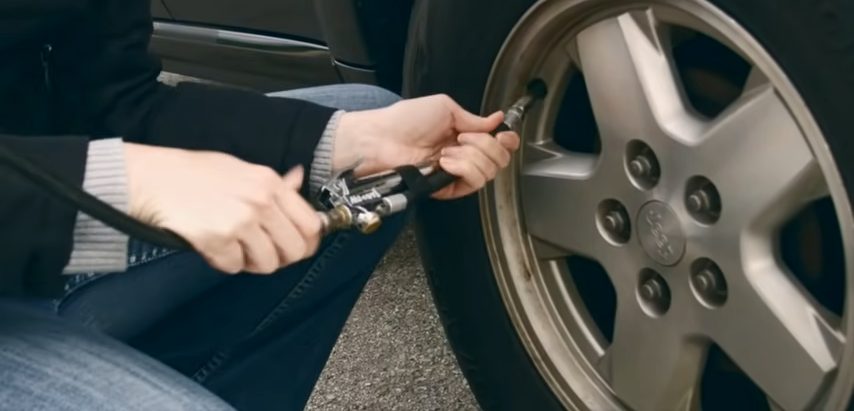 inflate the tire with an air compressor