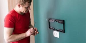 How to Mount a TV Without Drilling?