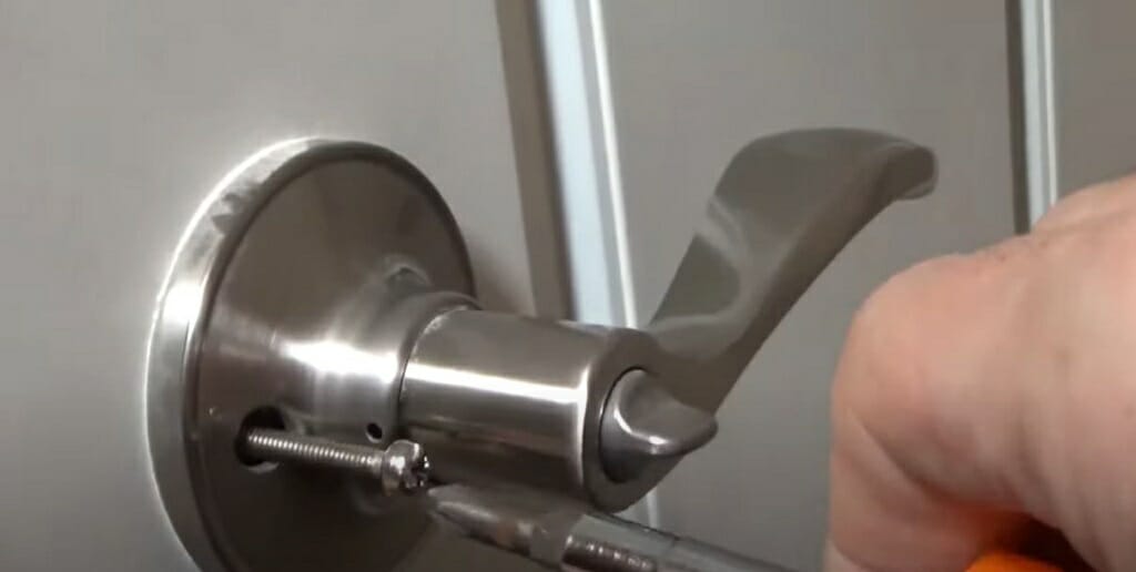 screw and remove old door knob
