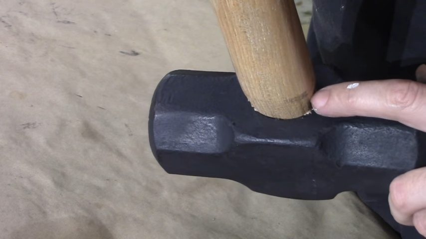 sliding the hammerhead into the handle