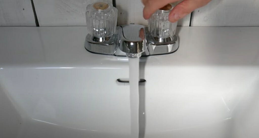 water flowing on sink