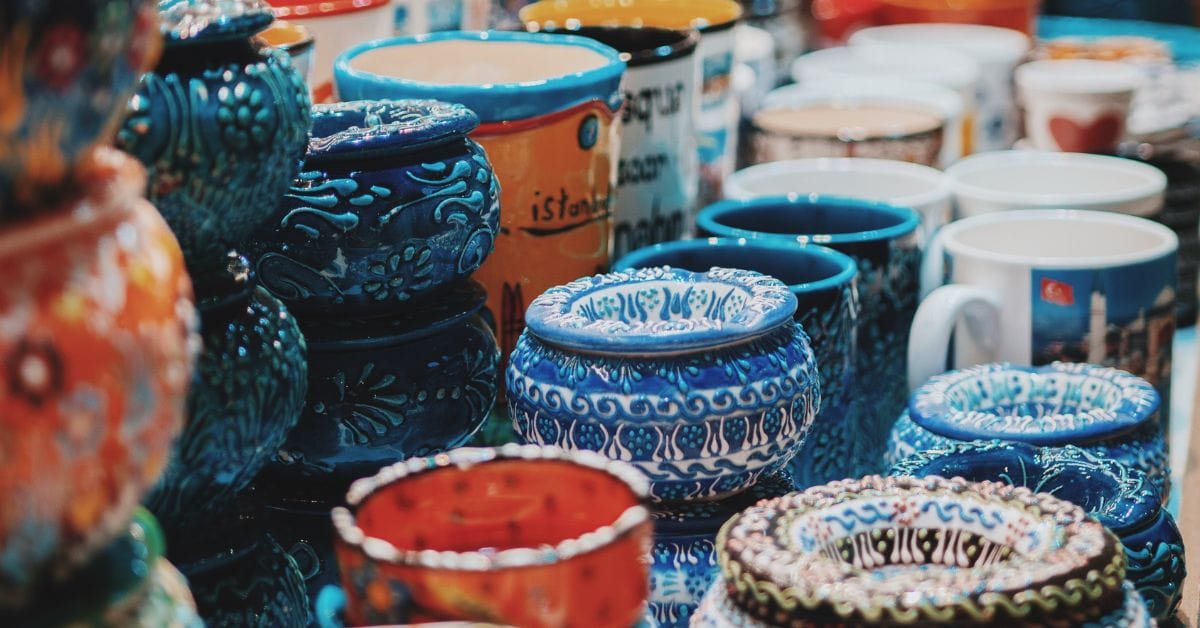 A display of colorful ceramic pots and jars