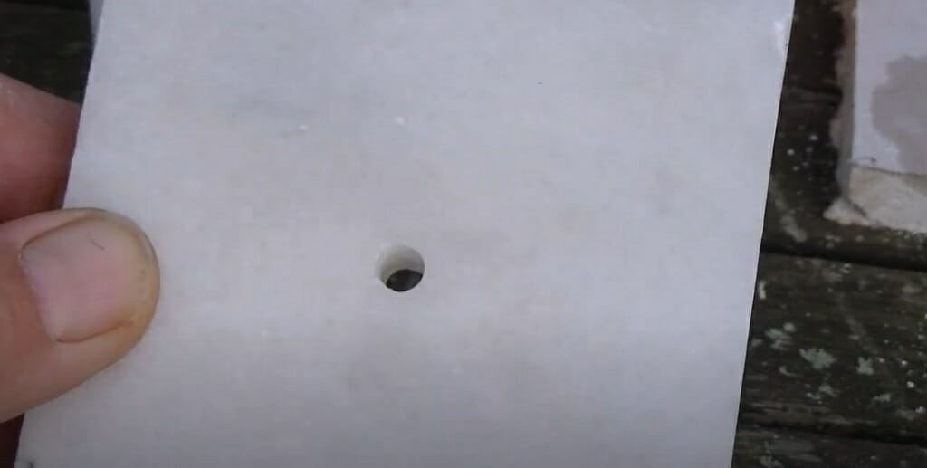hole in a marble tile