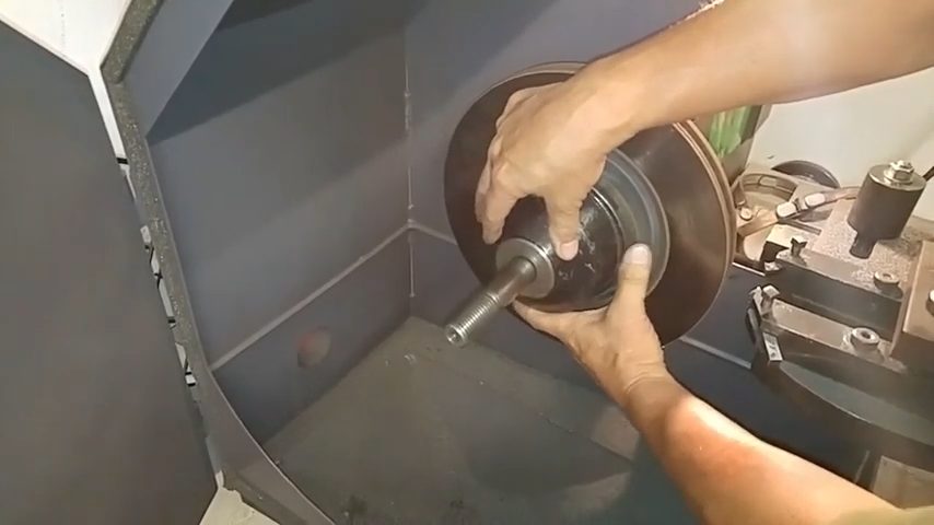 installing the rotor on the brake lathe