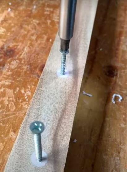 screwing the hole on the wood