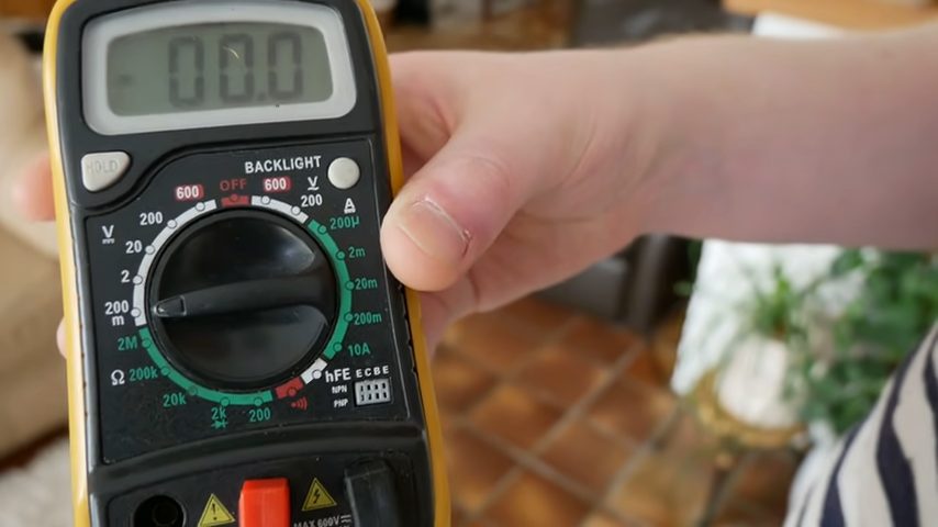 setting up multimeter at 0.00 reading