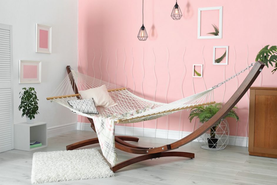 standalone hammock in a white/pink room