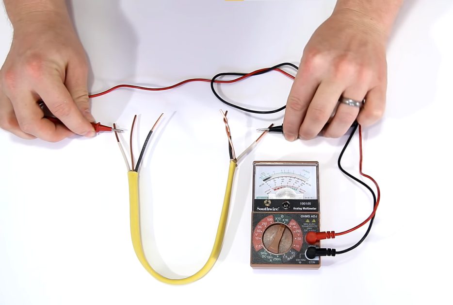 testing stripped white wire with multimeter