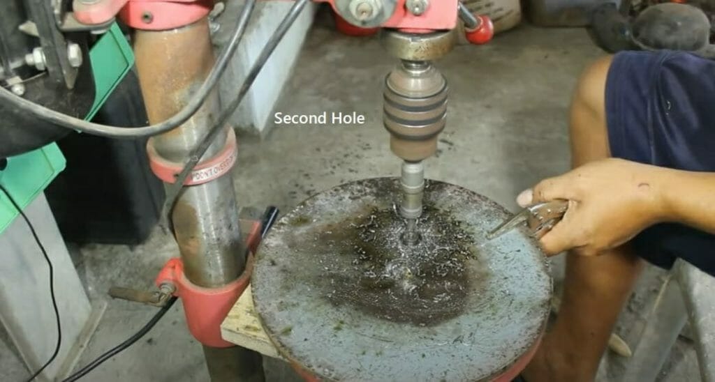 drilling another hole near the center hole