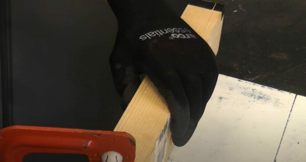 man wearing black gloves for safety