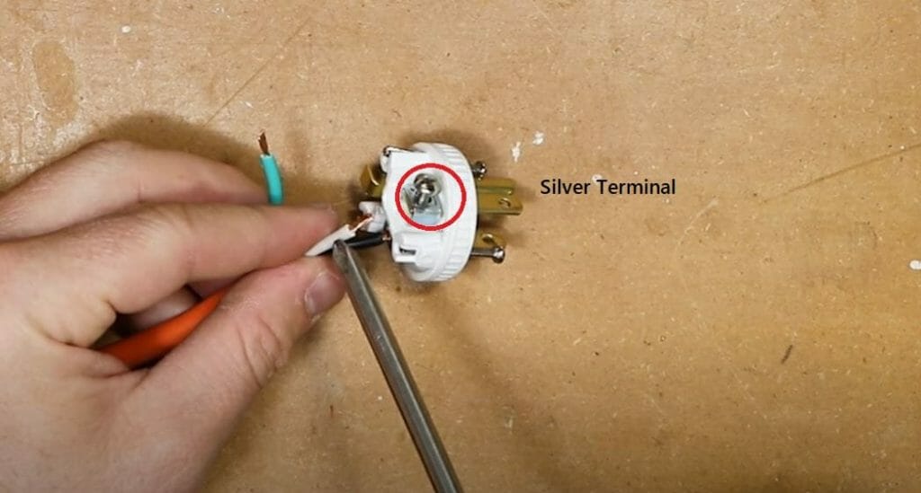 silver terminal of a screw terminal