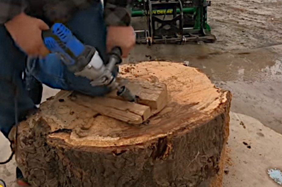 splitting firewood using a corded drill