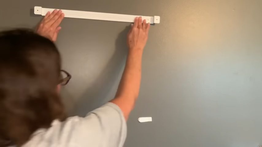 unscrew the bar from the pegboard