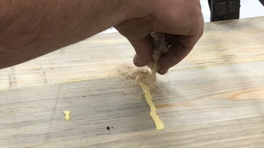 using sawdust and glue on the wood