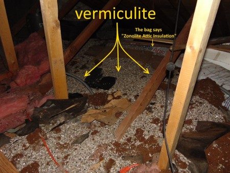 vermiculite insulation in an attic concealing electrical wiring