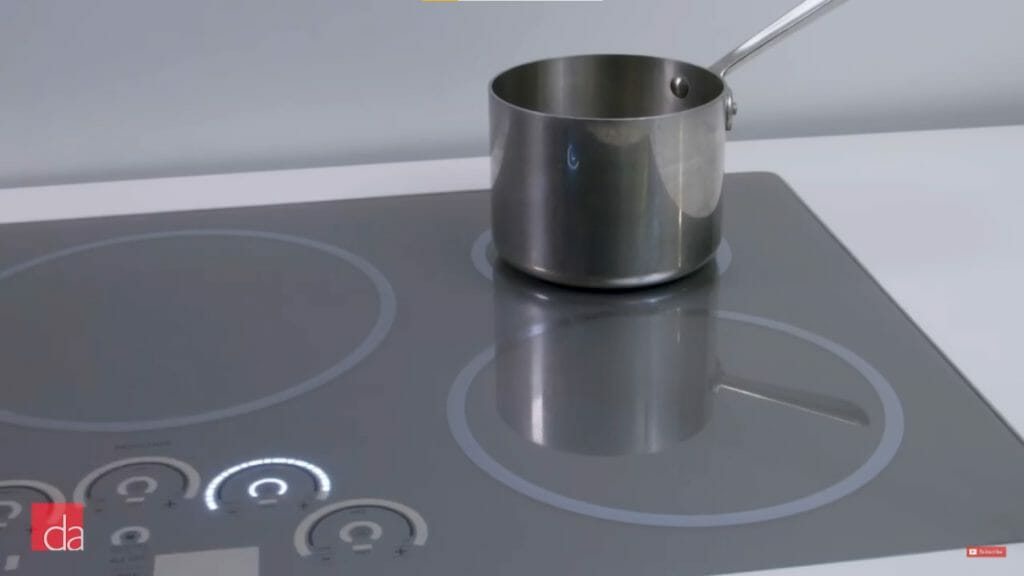an electric stove with pot