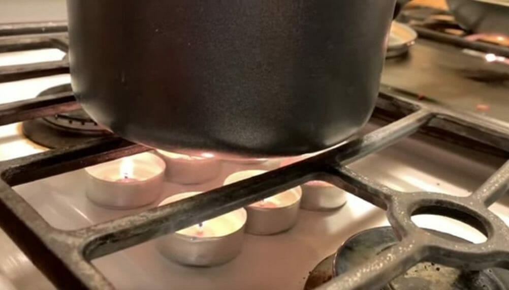 heating water over candles