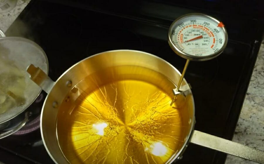 olive oil on the stove with heat meter