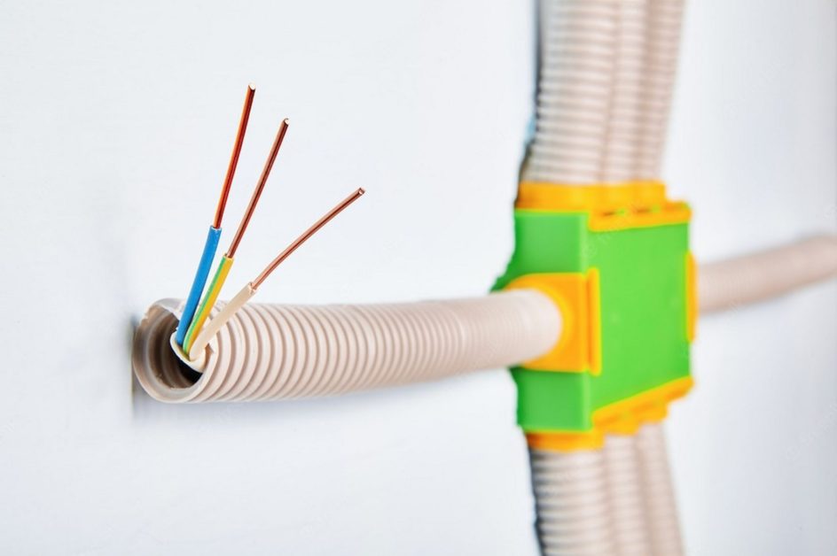 plastic electrical conduit connected to a distribution box