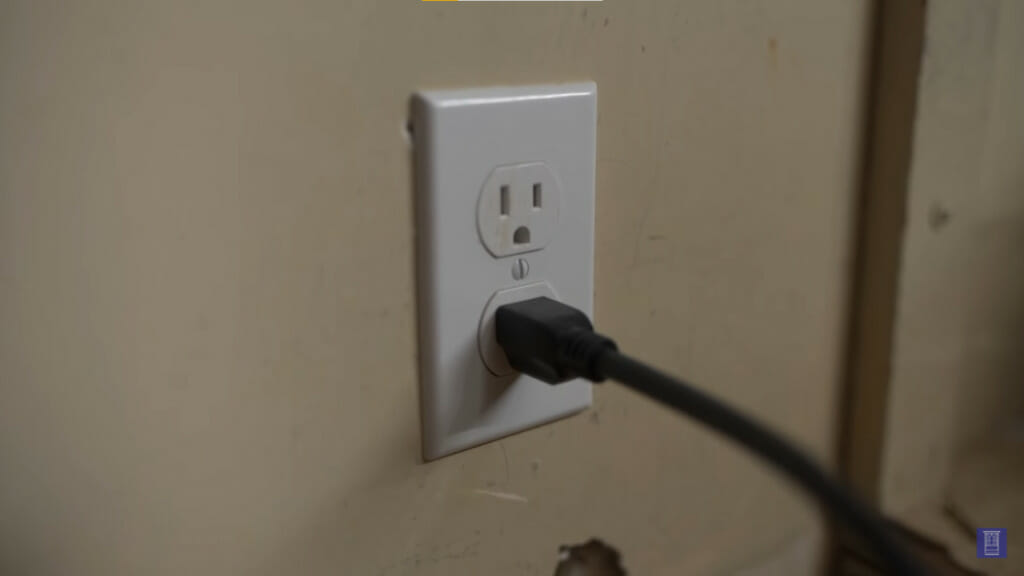 wire plugged in a 2-prong outlet