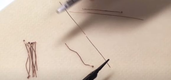 straightening wire using nylon jaw pliers