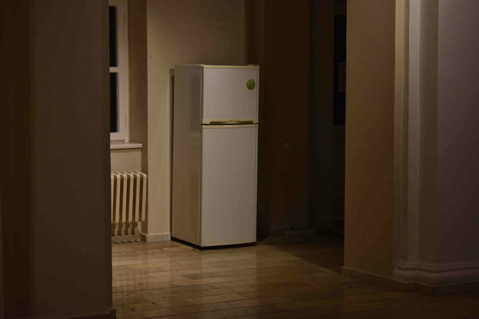 refrigerator and outlet beside