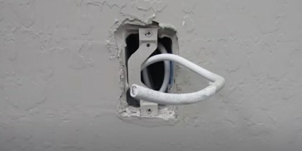 undone coaxial cable outlet