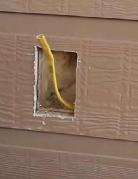 yellow wire on the drilled hole