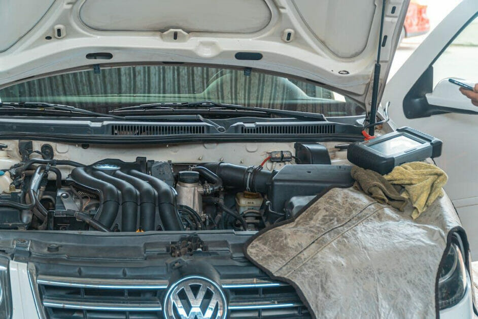 car tools at the top of an open hood