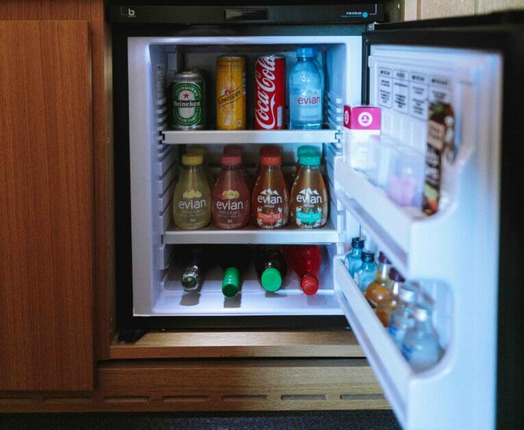 mini fridge opened with goods