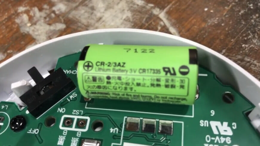 a lithium battery sealed in a smoke detector