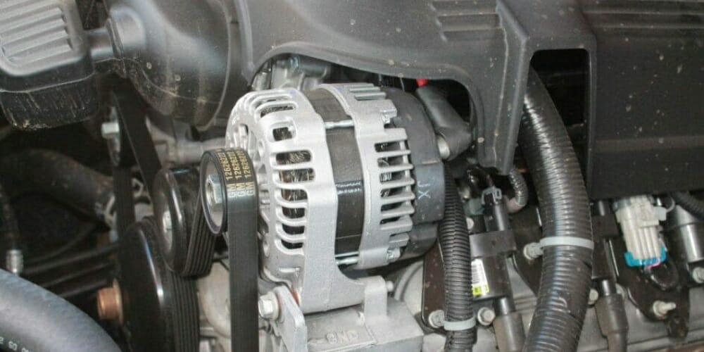 alternator connected to a car’s engine