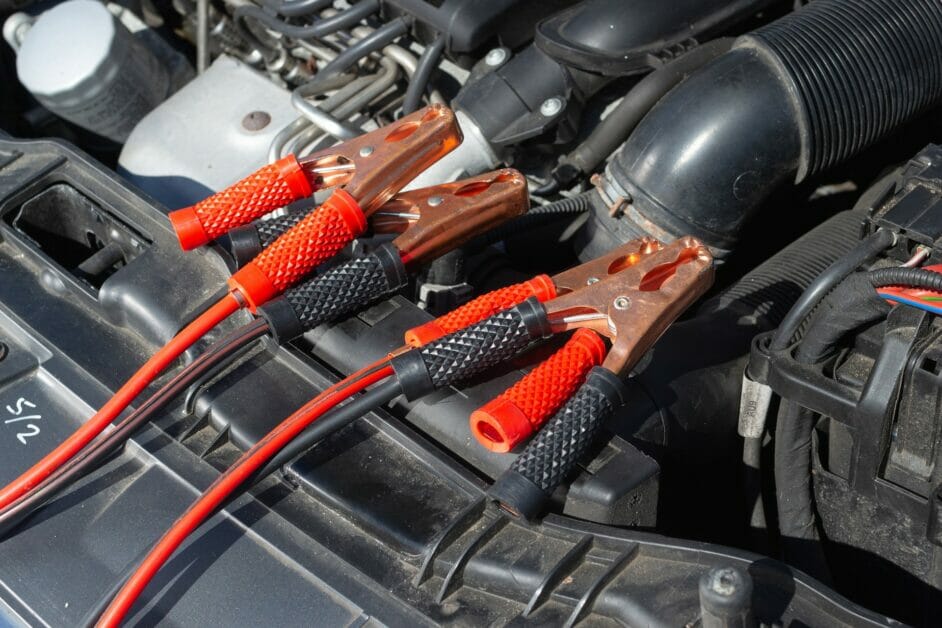 black and red wires attached to a car battery