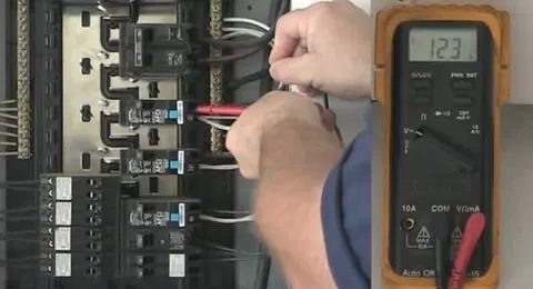 checking main panel with multimeter