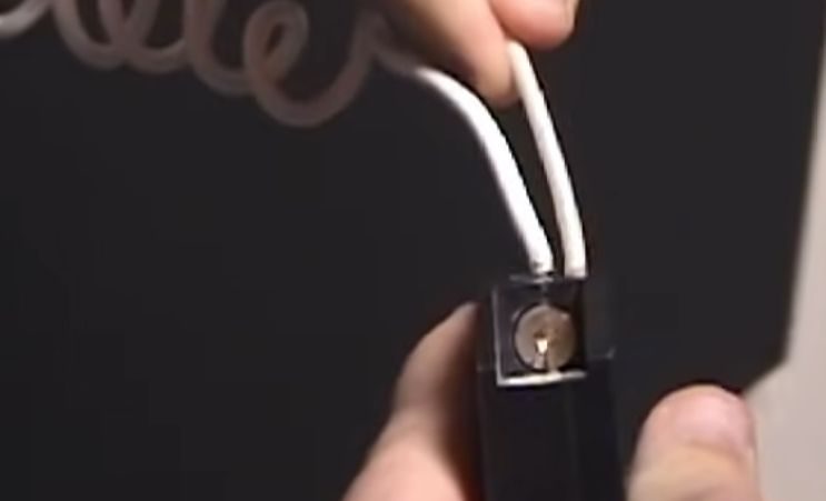 connecting the white wire to the silver screw